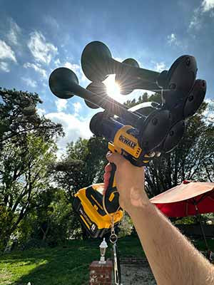 hand with train horn at the backyard